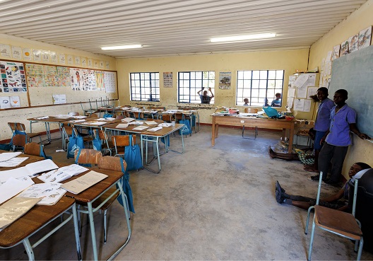 Children take a break from their studies in the classroom.